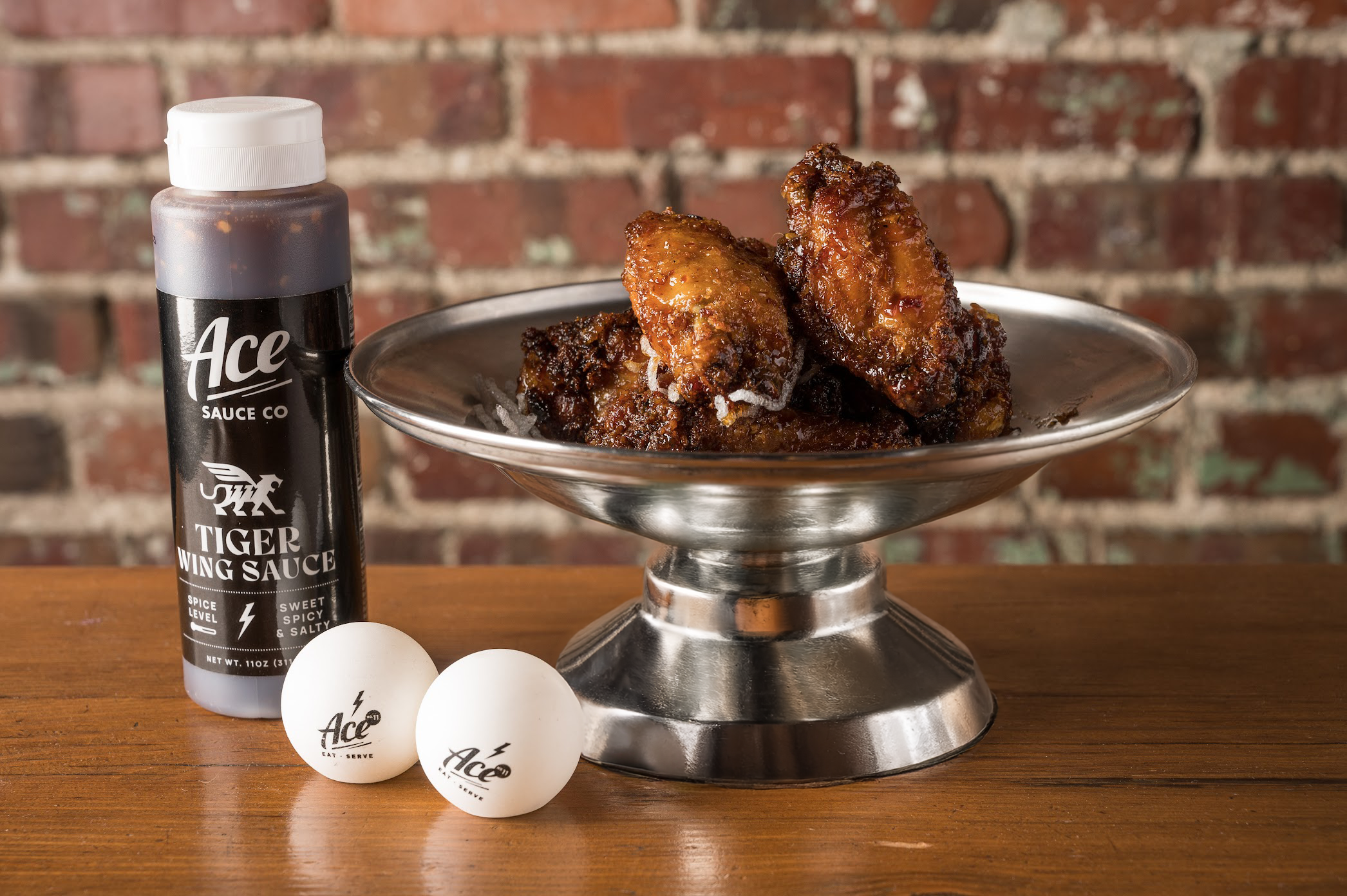 Meet award-winning Tiger Wing Sauce, a tantalizing blend of sweet, spicy, salty, and umami that roars with every bite. This versatile sauce, originally created for chicken wings, makes an ideal and easy companion for your favorite chicken, meat, fish, or even as a glaze for vegetables. The savory undertones and mouth-watering sweetness of the Tiger Wing sauce will be perfect for any occasion that calls for a touch of spice.

